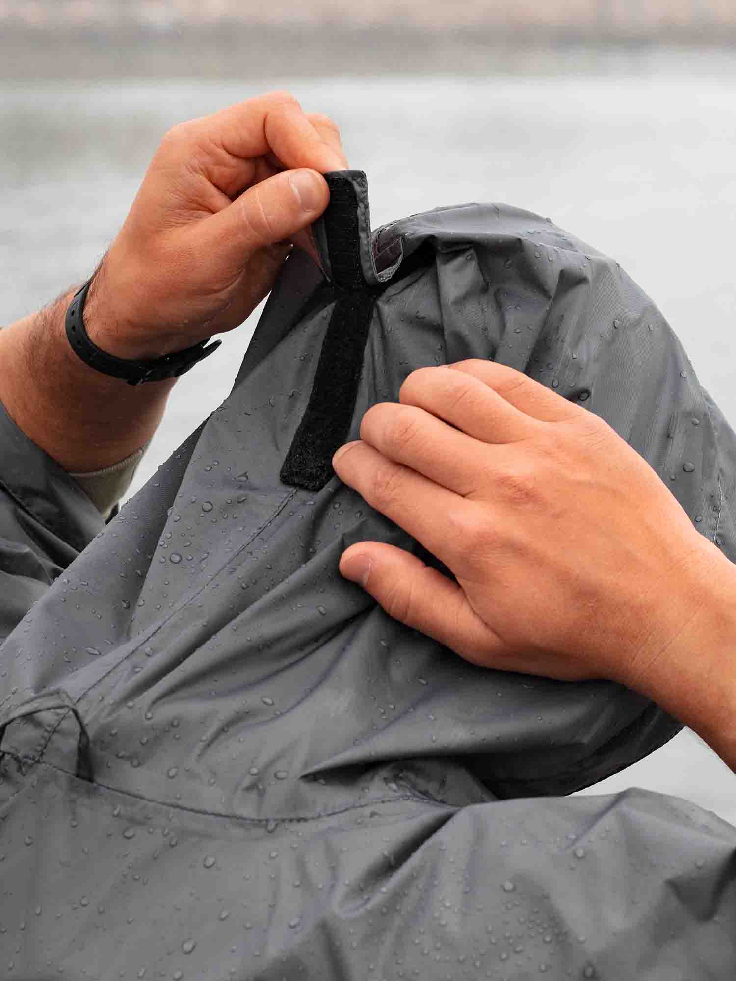 Hooded Rain Poncho pitched as A-frame shelter